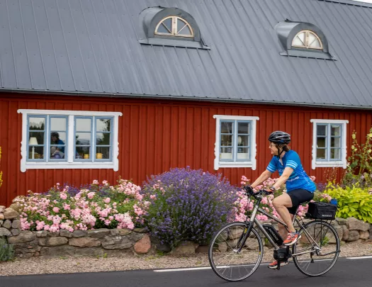 E-Biking by Red Building