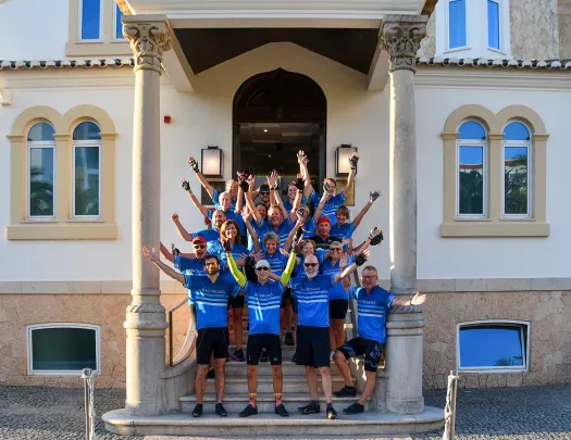 Backroads guests cheering, posing for photo.