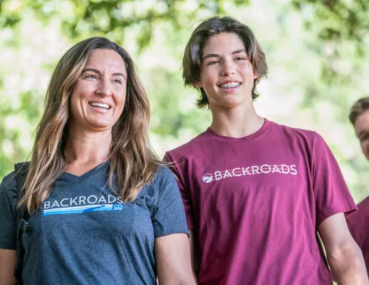 Three guests in BR gear, looking to distance.