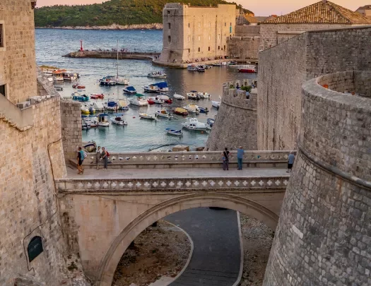 Walled outskirts of Dubrovnik during sunset.