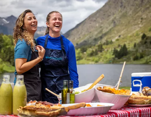 Two leaders with a prepared Backroads picnic
