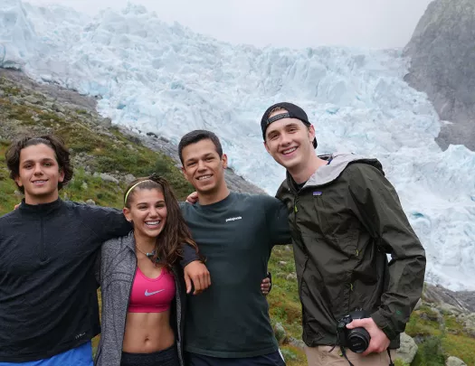 Group of four teenagers hiking in Norway