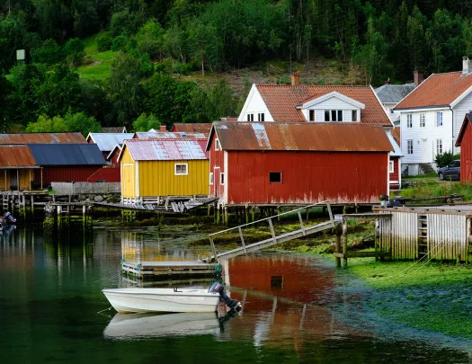 Colorful houses in Norway along the banks of a fjord