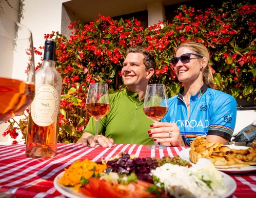 man and women drinking wine
