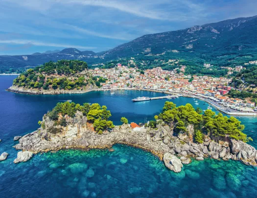 View of cottage lined islands in clear blue water