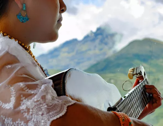 Woman playing the guitar