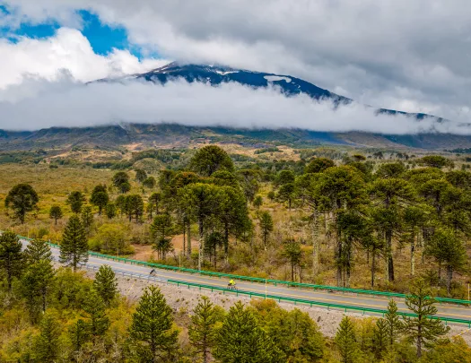 Large, open valley with an empty road in the center