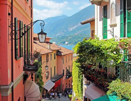 Alleyway of houses with mountains in the distance
