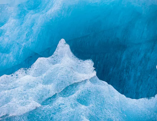 Ice cap on top of a mountain of snow