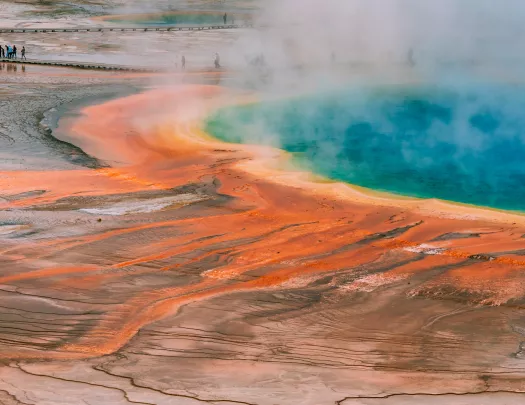 Large geyser with orange floor and blue water
