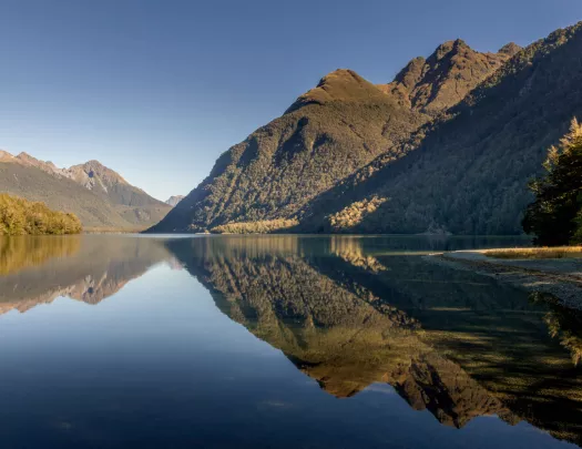 Large lake with mountains in the background