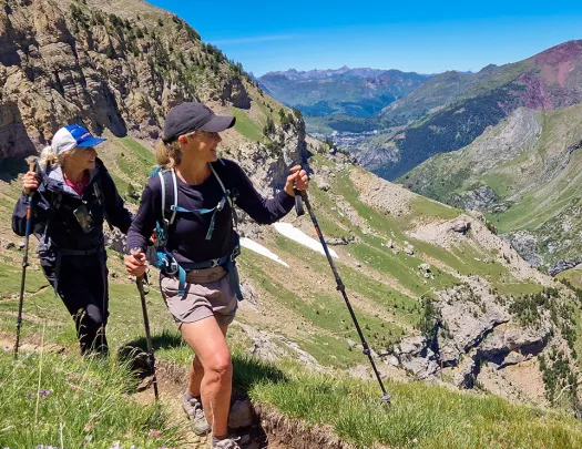 Two backroads guests hike through the mountains