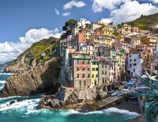 Houses and apartments on a cliff by the ocean