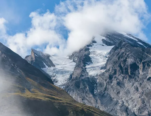 Mountains with clouds over them