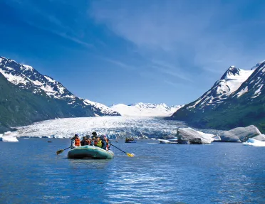 Rafting by a glacier in Alaska