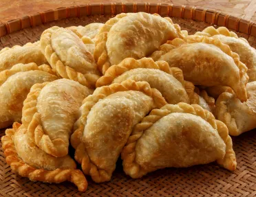 Close-up of platter of empanadas.
