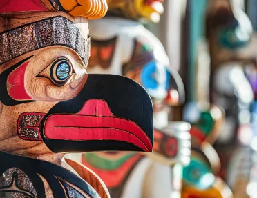 Close-up of totem pole carvings.