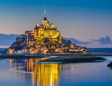 Le Mont Saint-Michel Tidal Island in Twilight During Blue Hour at Dusk, Normandy, Northern France