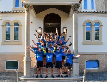 Backroads guests cheering, posing for photo.