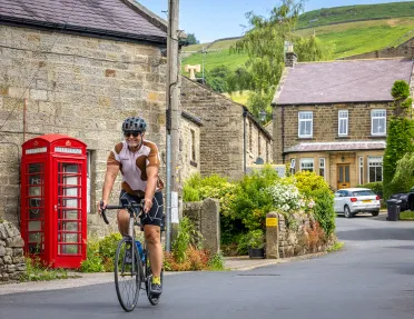Cyclist Red Telephone Booth Scotland