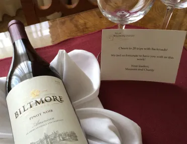 Close-up of Biltmore wine bottle and glasses.