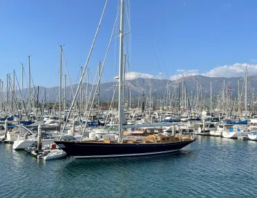 Wide shot of ship fleet on water.