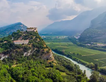 Village on a hill above a river in Italy