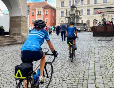 Bikers riding through a city in Czech Republic.