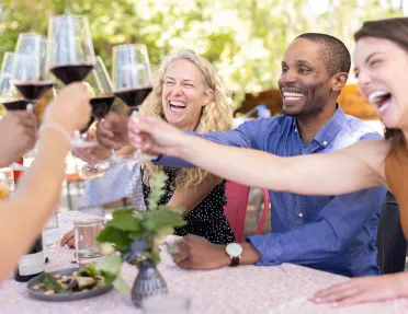 Backroads Guests Cheering Wine Glasses