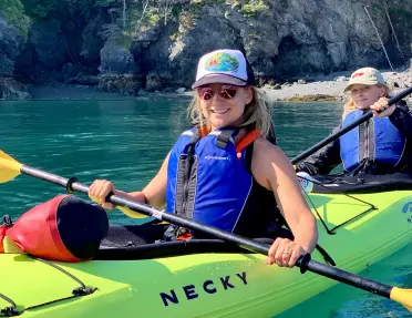 Guests in green kayak
