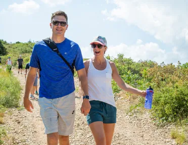 Backroads Guests Smiling on Hike