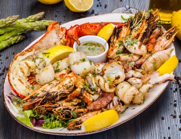 Seafood platter with shrimp, lobster, scallop, squid and octopus.