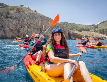 Group of happy young kayakers