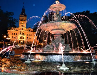 Large fountain instillation at night.