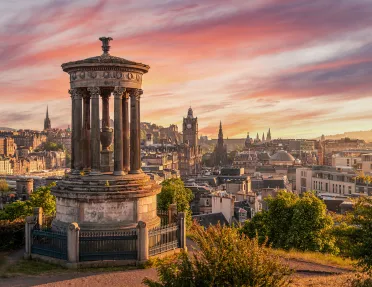 Monument overlooking the city during sunset
