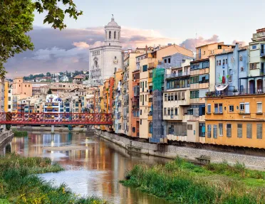 Wide shot of Onyar River running through Girona and it's colorful buildings.
