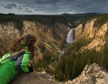 Backroads guest peering out into a valley