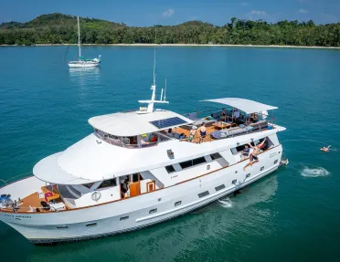 People jumping off yacht