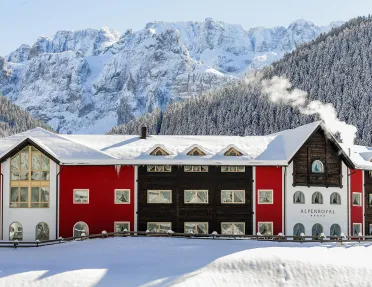 colorful hotel covered in snow