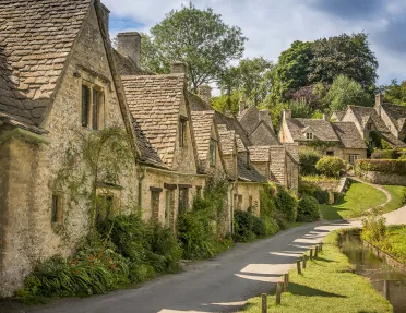 Rustic. brick houses along a narrow road