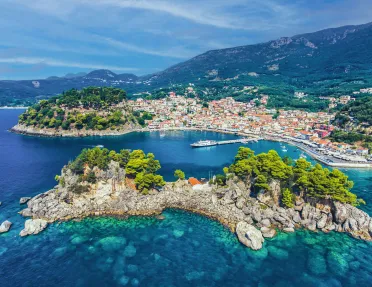 View of cottage lined islands in clear blue water
