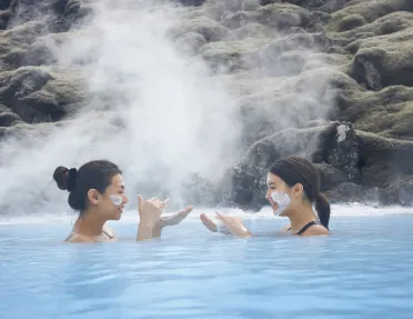 two guests floating in a hotspring