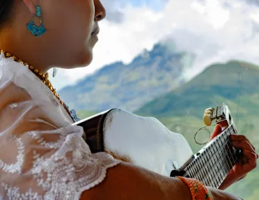 Woman playing the guitar