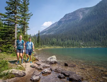 backroads guests hiking by a lake