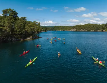 kayaks on a blue river