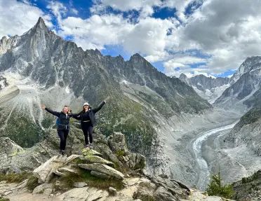 Two hikers on top a mountain