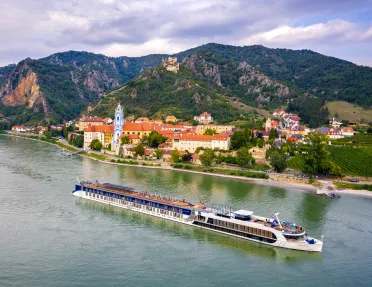 Large boat floating on a long river