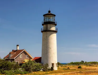 Isolated light tower by the ocean