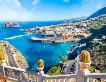 Sky view of a small town next to the ocean shore