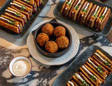 Dishes of fried foods on a table
